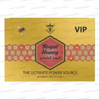 A close-up view of the front of a Royal Honey VIP box. The goldenrod yellow box has a repeating honeycomb pattern. A prominent maroon hexagonal logo in the center features the text "Royal Honey" in a decorative font and Arabic text below it. A detailed image of a bee is on the left, and "VIP" is in a large, bold font on the right.