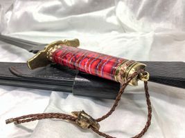Custom knife with stabilized mammoth tooth handle scales
