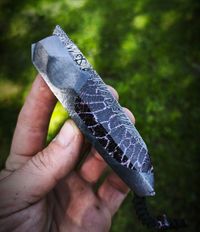 Custom knife with stabilized fossil coral handle scales
